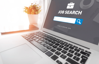 Laptop screen with Kazi Cloud job search interface, showing text 'JOB SEARCH' and 'FIND A DREAM JOB', representing free job posting sites in Kenya.